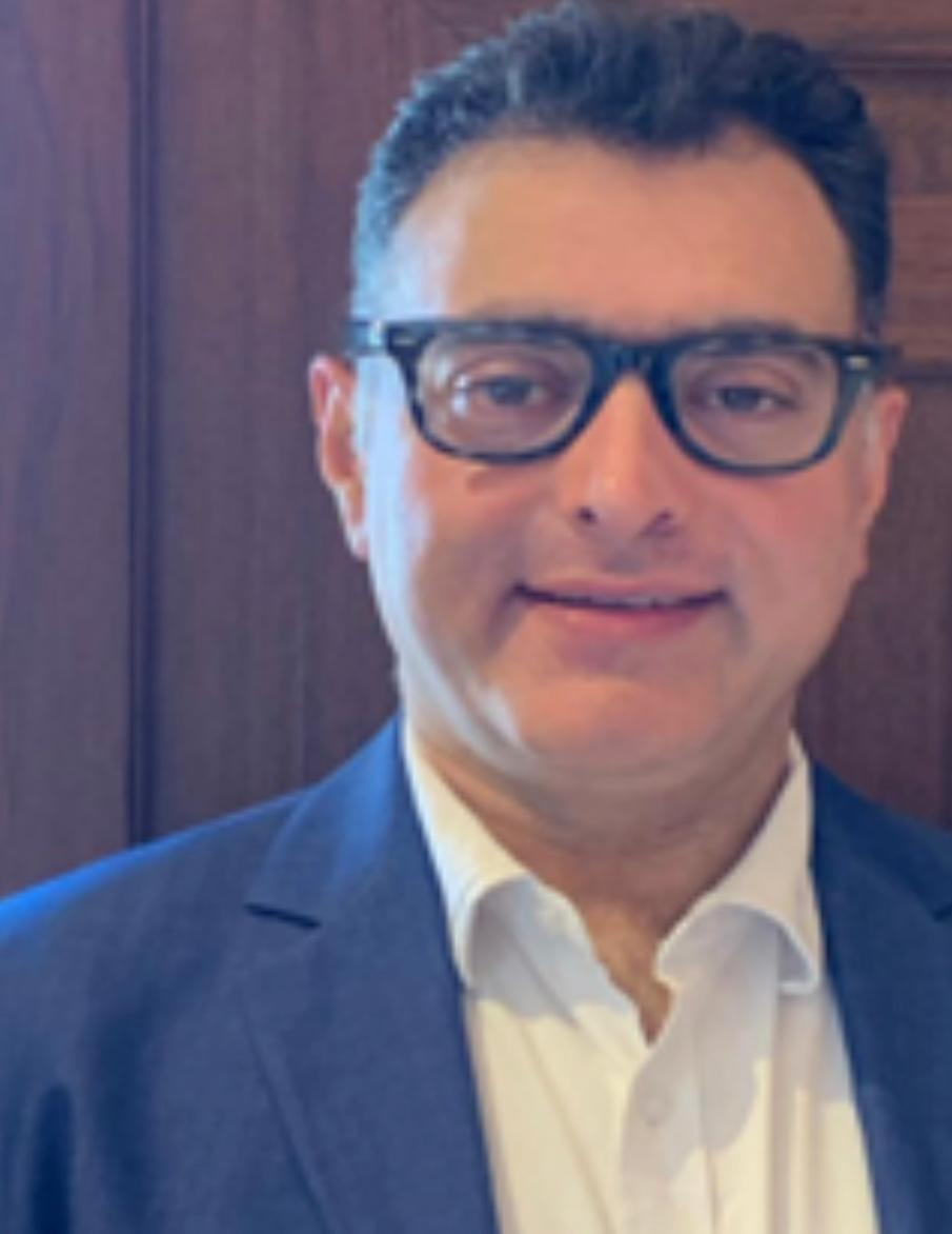 Dr. Romil Tikko